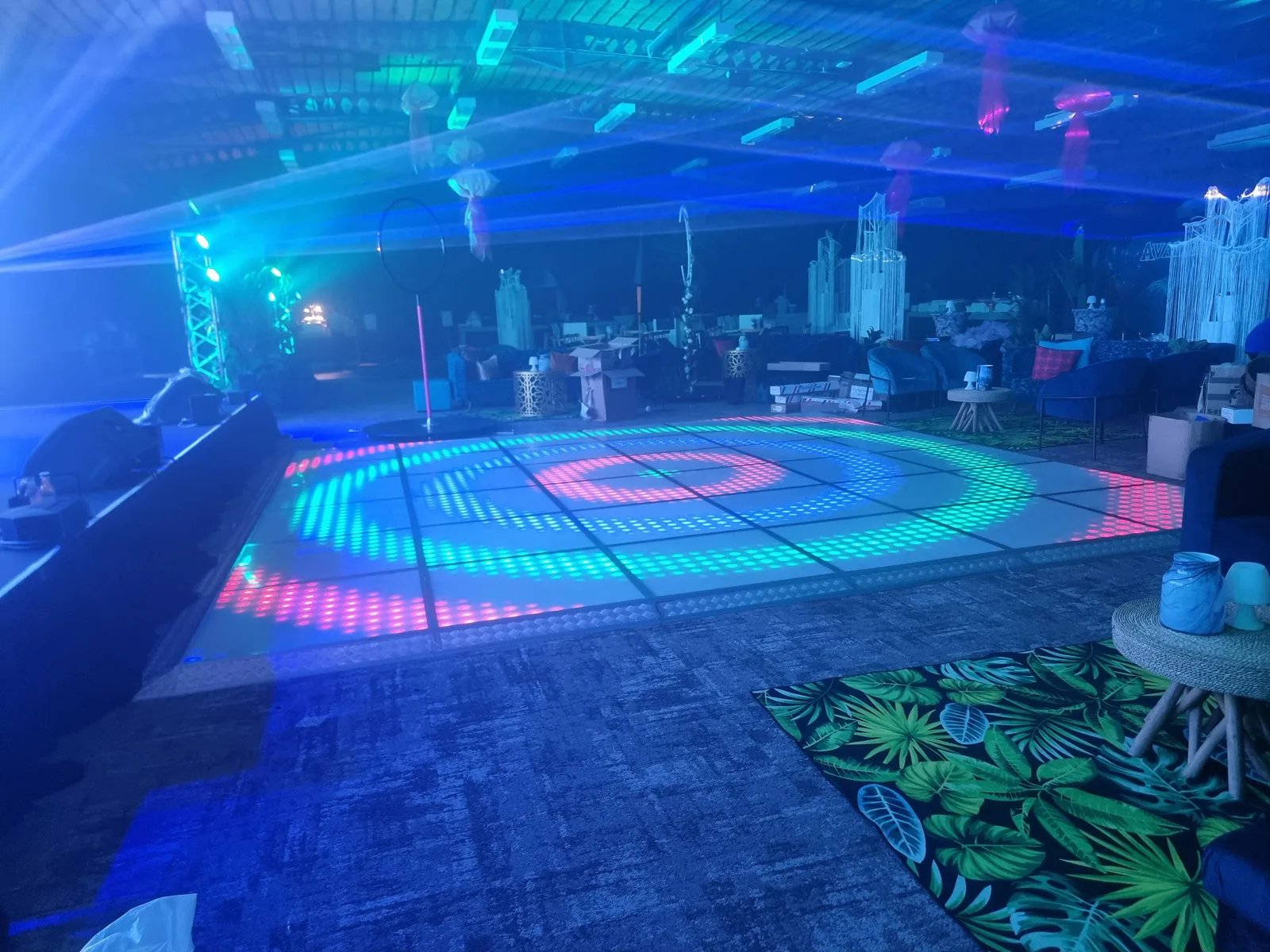 Blue, pink and green floor at a themed venue